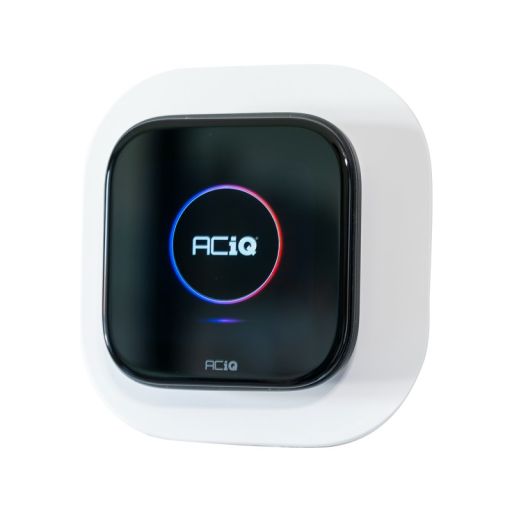 Smart thermostat mounted on wall