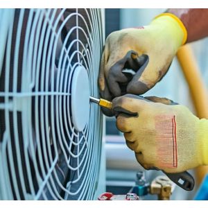 How to Self-Install a Mini Split System - Technician installing a DIY mini split ac