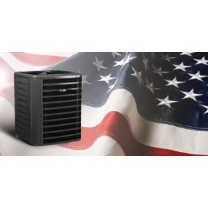 ACiQ heat pump unit positioned in front of a waving American flag, symbolizing the future of energy-efficient HVAC in the U.S.