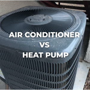 Outdoor air conditioner condenser unit beside a stucco wall and greenery, overlaid with the text ‘Air Conditioner vs Heat Pump’
