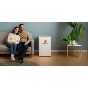 Couple relaxing in a dry, comfortable home with a Santa Fe residential dehumidifier controlling humidity in the living room.