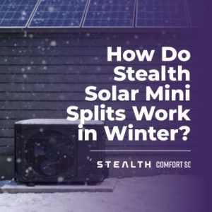 Stealth solar mini split outdoor condenser operating in snowy winter conditions with solar panels on the roof as a list image