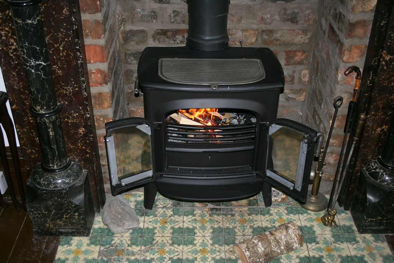 Wood heat stove burning efficiently in a home