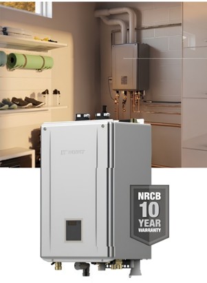 Front view of the Noritz NRCB combination boiler showing the champagne finish housing, digital control panel, and bottom plumbing connections