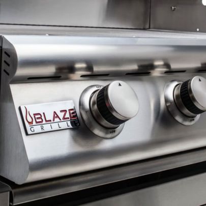 Close-up of Blaze built-in gas grill ignition and burner control knobs
