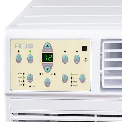 Close-up of the ACiQ mini PTAC air conditioner control panel with digital temperature display, mode buttons, and fan settings.