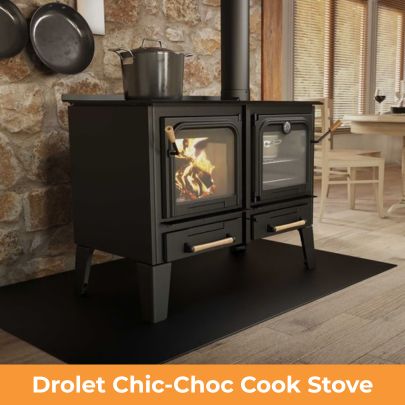Drolet Chic-Choc wood cook stove with cooking surface and firebox installed in rustic kitchen setting