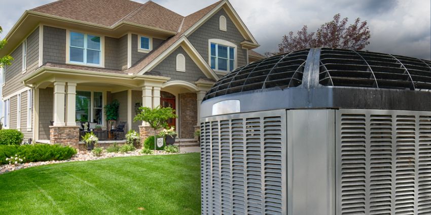 Modern Central Air Conditioning Unit Outside a Suburban Home Central air conditioner installed outside a modern suburban house with green lawn and cloudy sky