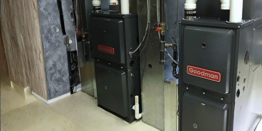 Goodman Gas Furnaces – Reliable and Energy-Efficient Heating Solutions Two Goodman gas furnaces installed side by side for efficient home heating