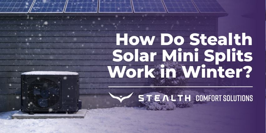 Stealth solar mini split outdoor condenser operating in snowy winter conditions with solar panels on the roof